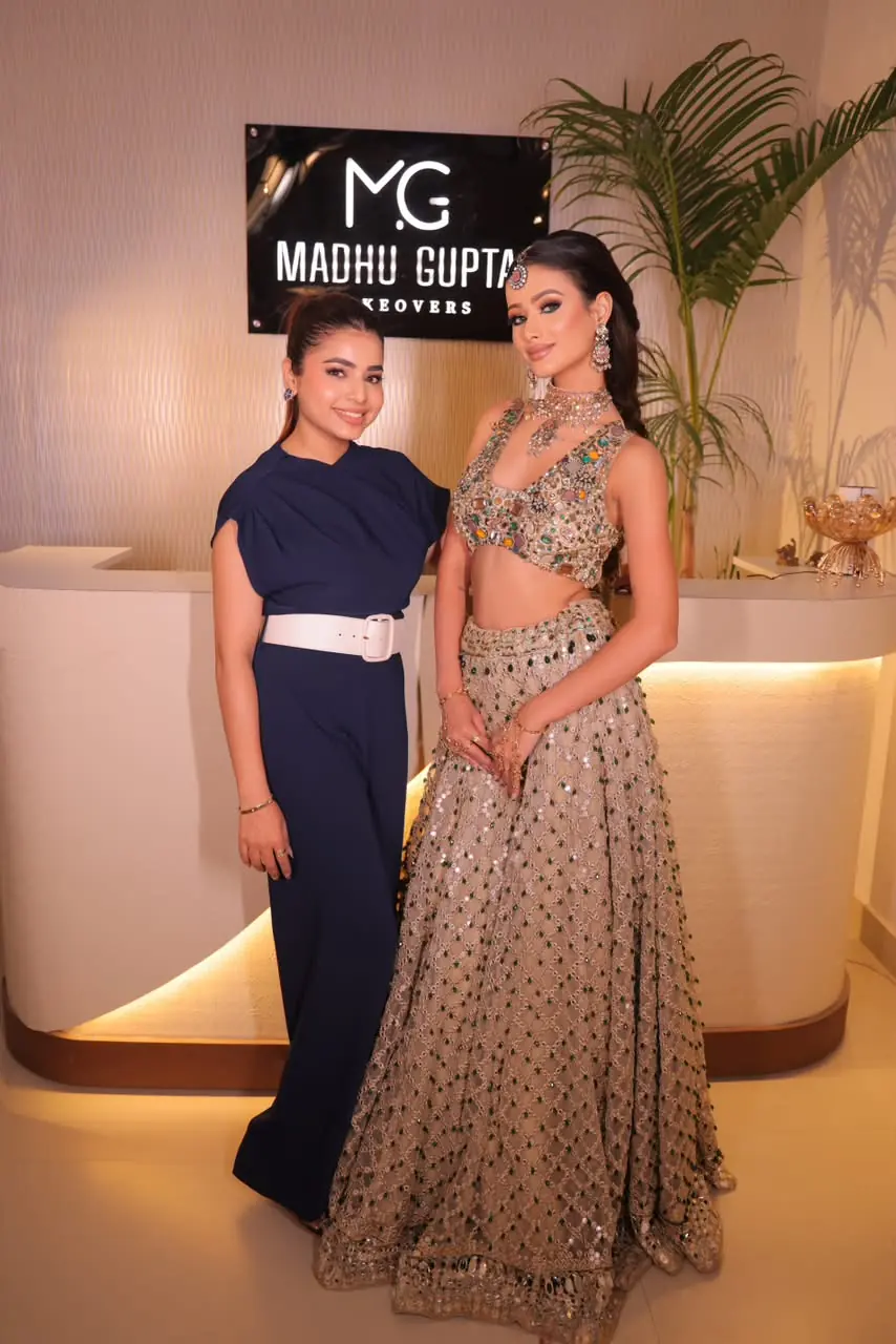 Madhu Gupta with a bride in sangeet makeup at MG Makeovers, Gurugram